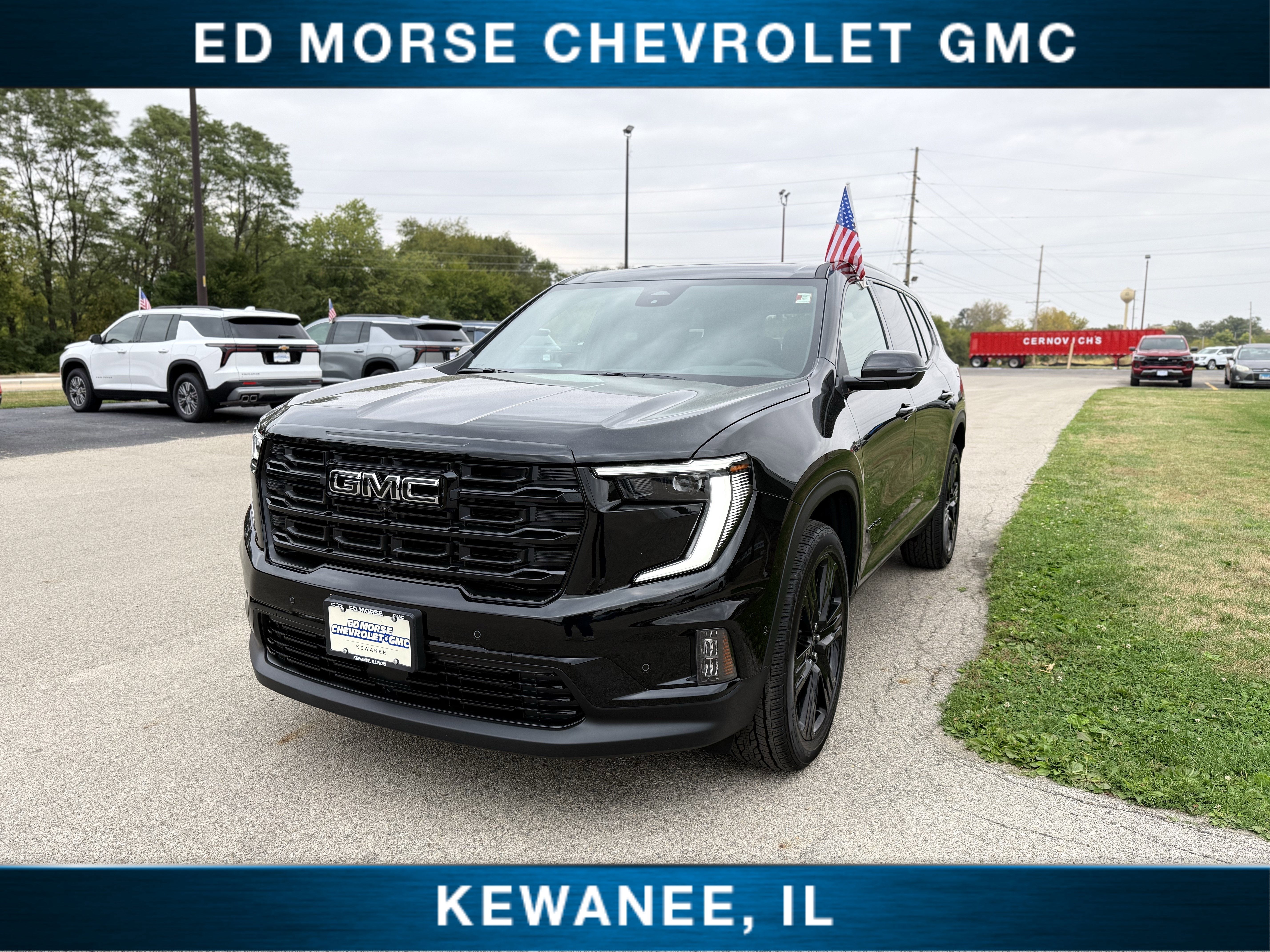 2026 GMC Acadia Elevation in Ebony Twilight Metallic — front three-quarter view