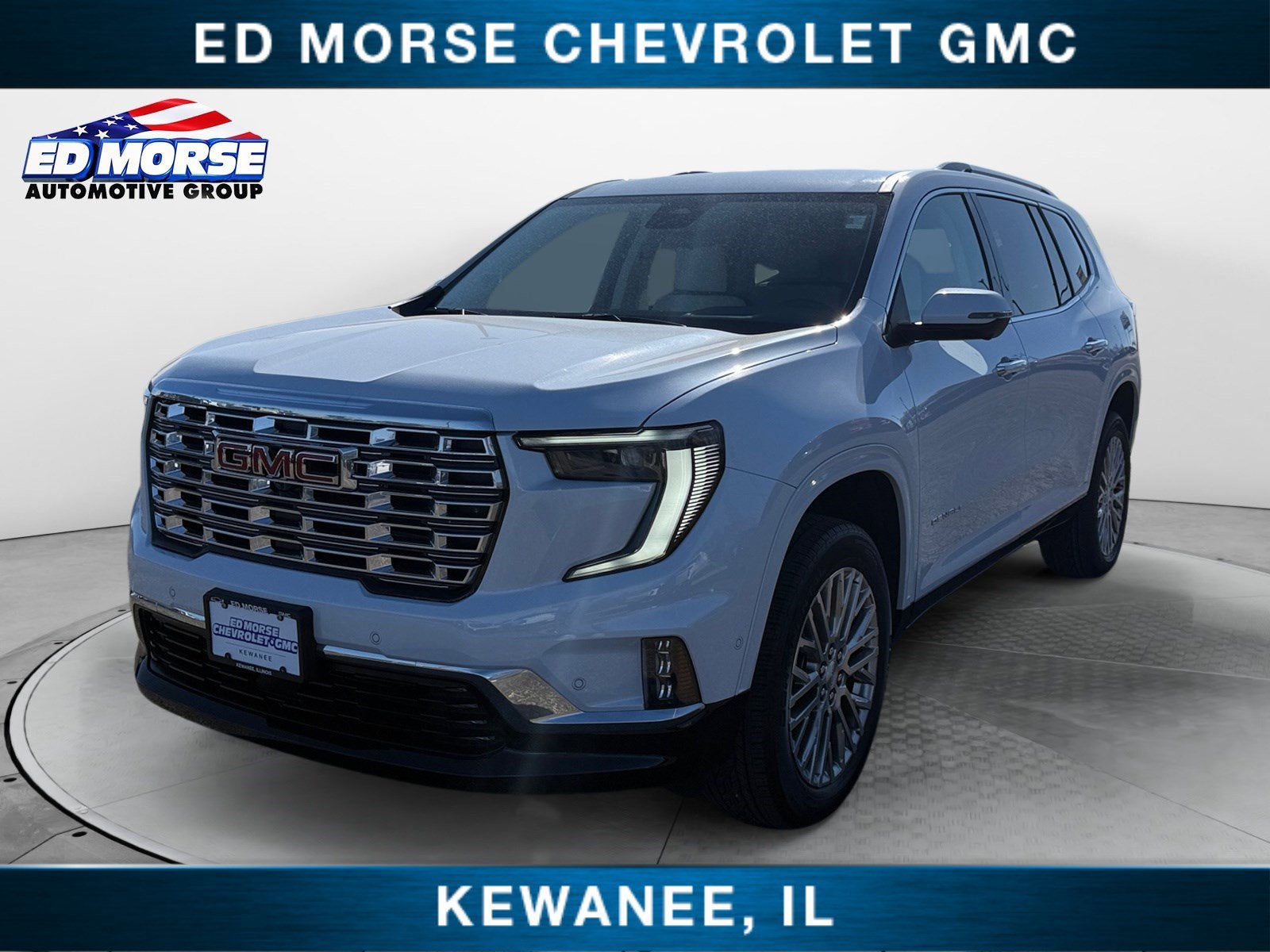 2026 GMC Acadia Denali in Glacier White Tricoat — front three-quarter view