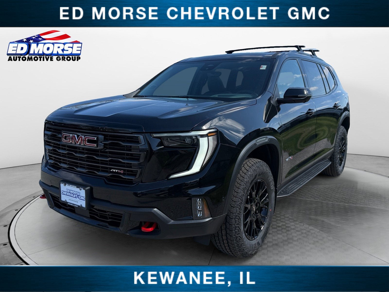 2026 GMC Acadia AT4 in Ebony Twilight Metallic — front three-quarter view