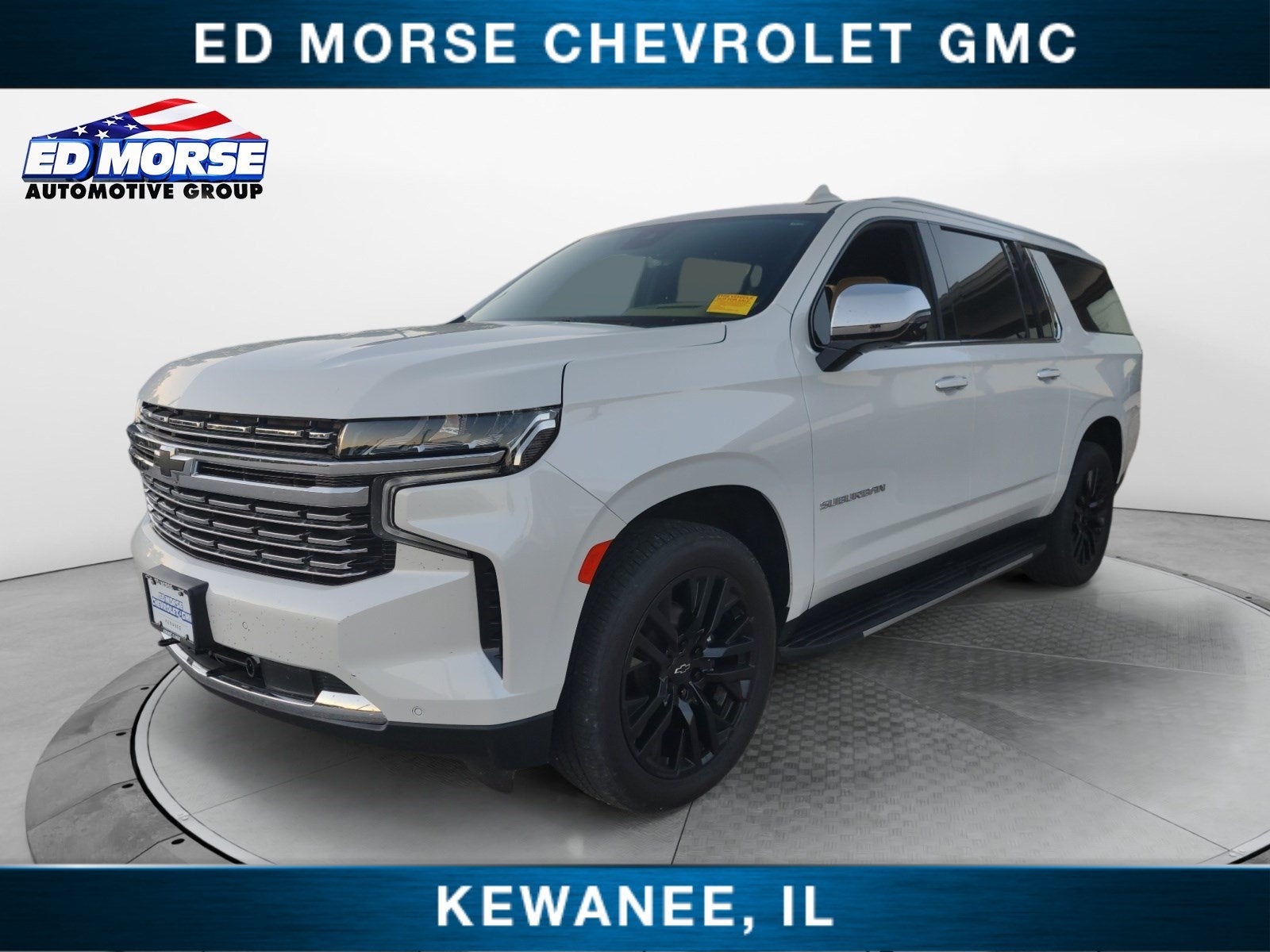 2023 Chevrolet Suburban Premier in Iridescent Pearl Tricoat — front three-quarter view