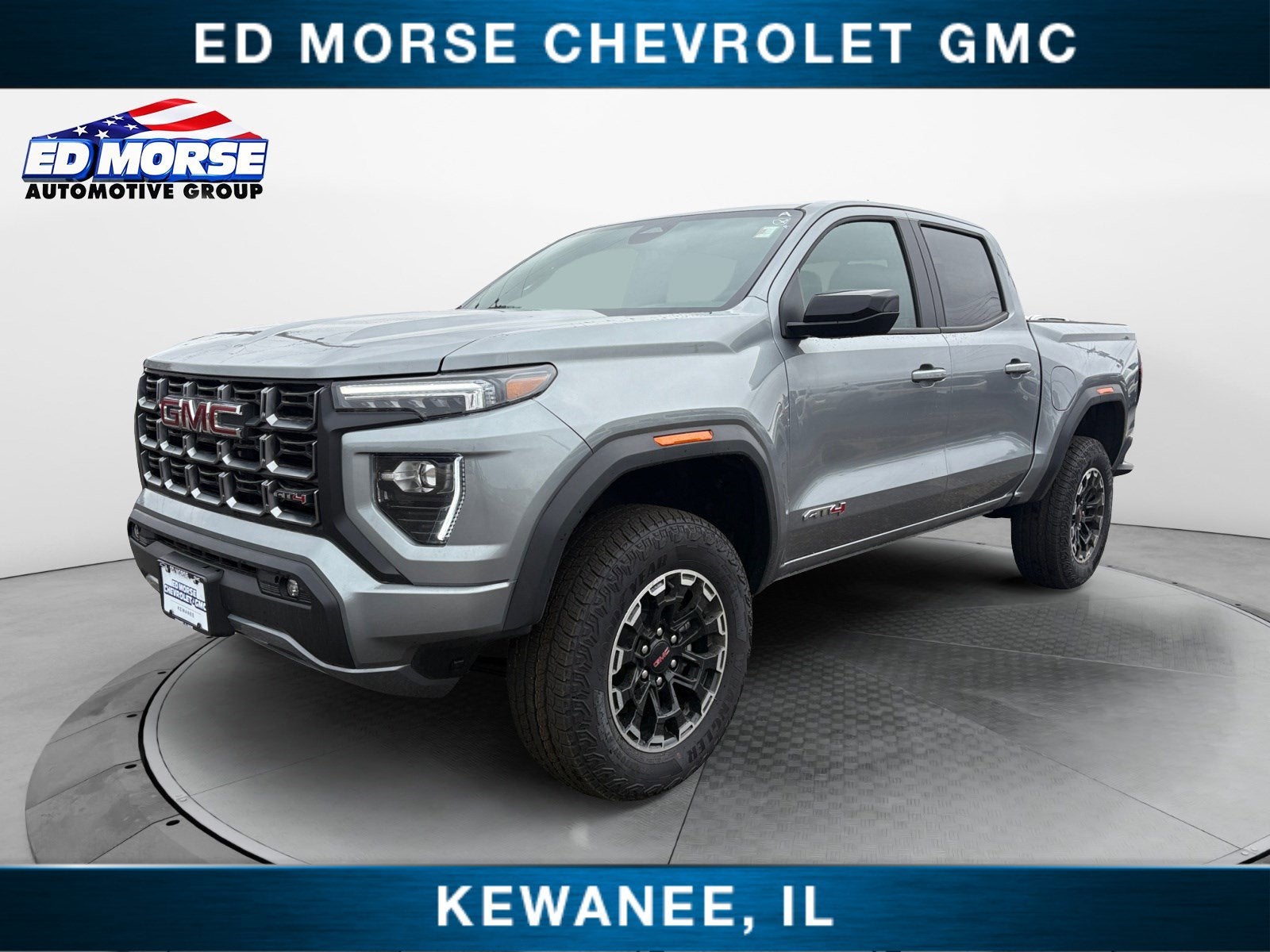 2026 GMC Canyon AT4 in Sterling Metallic — front three-quarter view