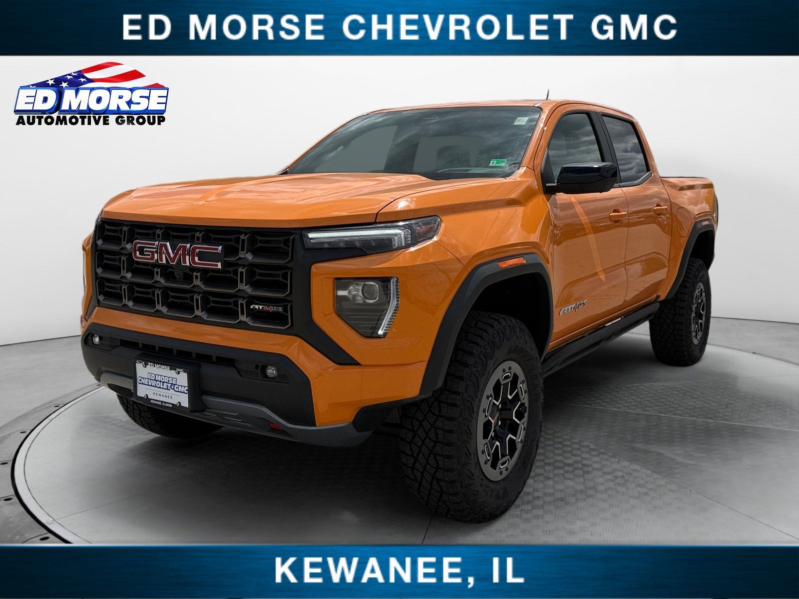 2026 GMC Canyon AT4X in Desert Sun — front three-quarter view
